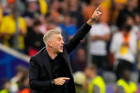 Romania's head coach Edward Iordanescu